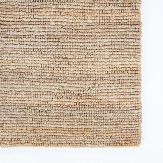 Handknotted jute entrance mat styled in contemporary hallway – BLACK Concept Store