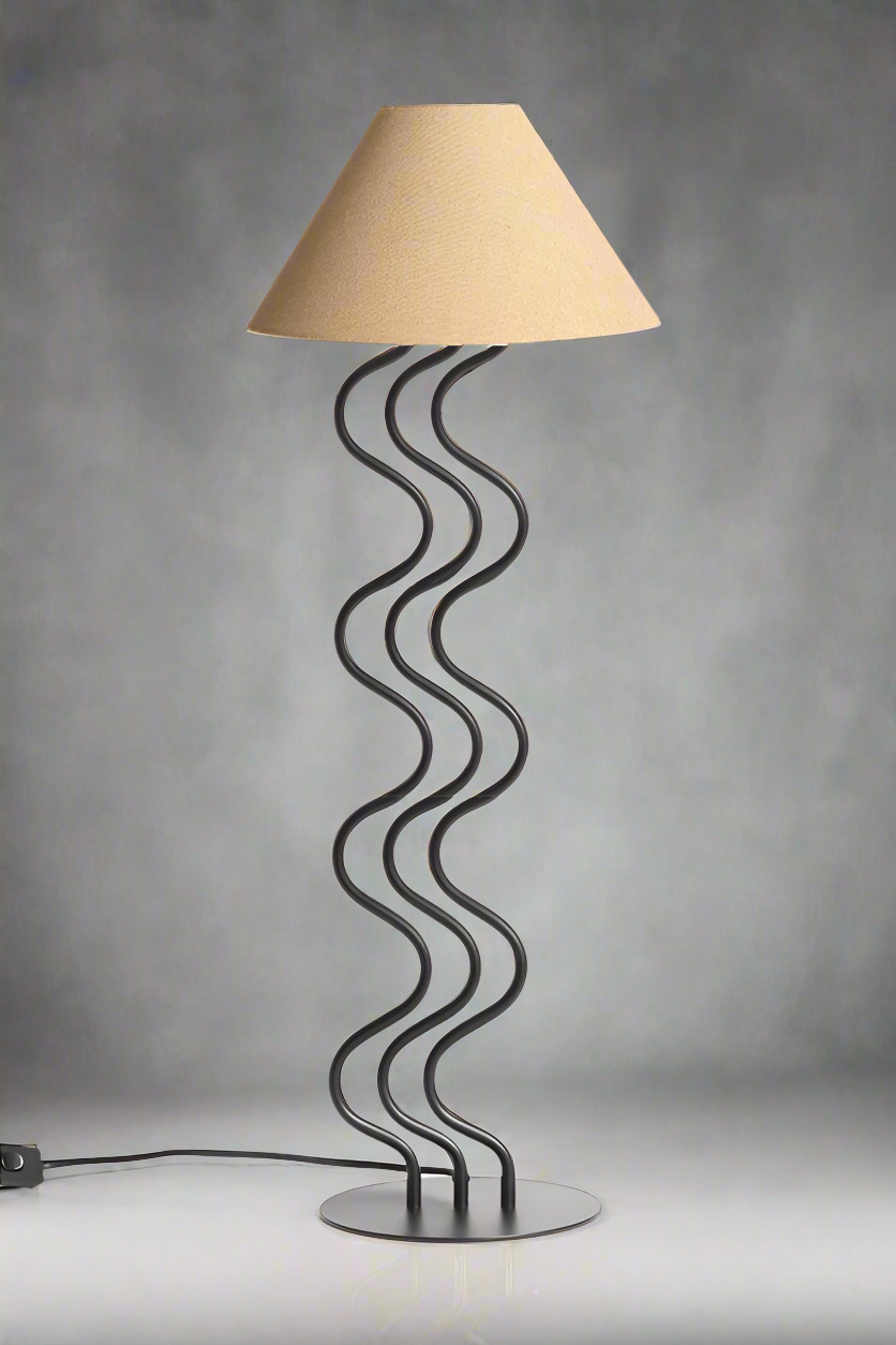 Surge Floor Lamp with ripple-inspired sculptural base and linen shade