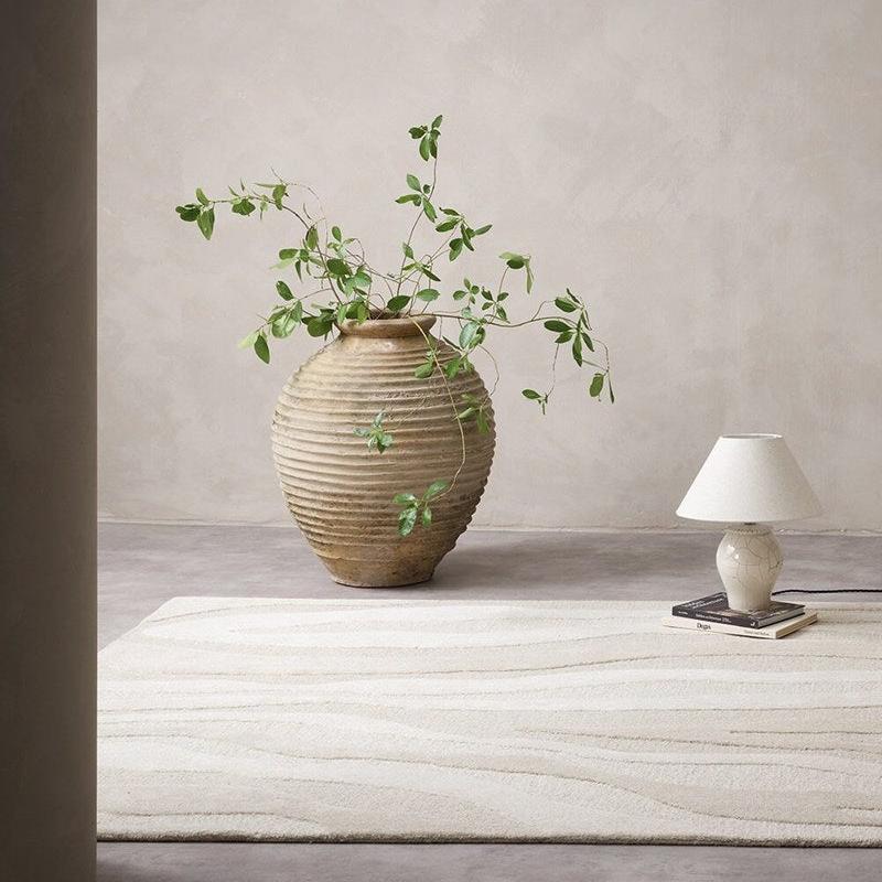 Handtufted coastal sand rug styled in living room – BLACK Concept Store