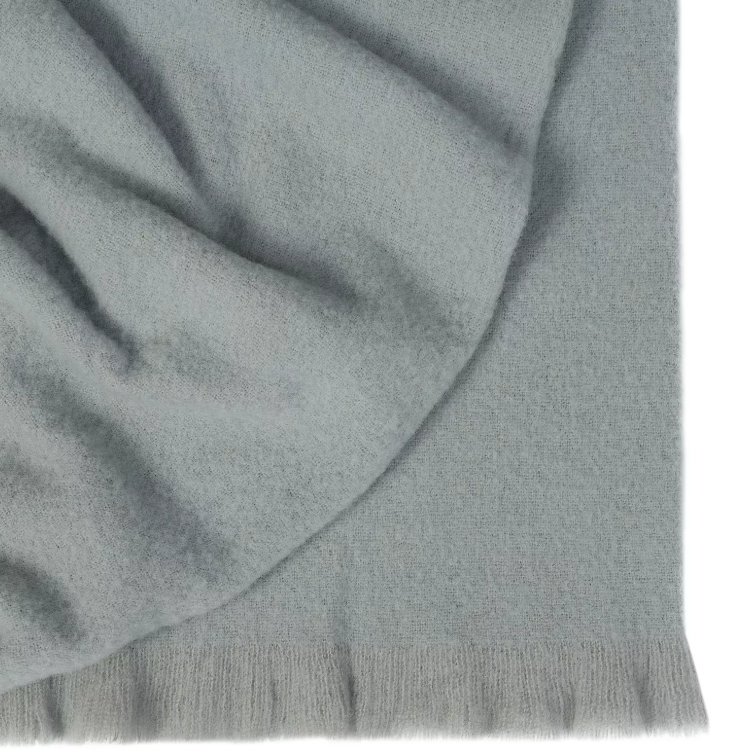 Shop the Hyde wool blend throw 130x200cm – New Zealand made with plush brushed texture and tassel fringe, soft, tactile, and perfect for gifting.