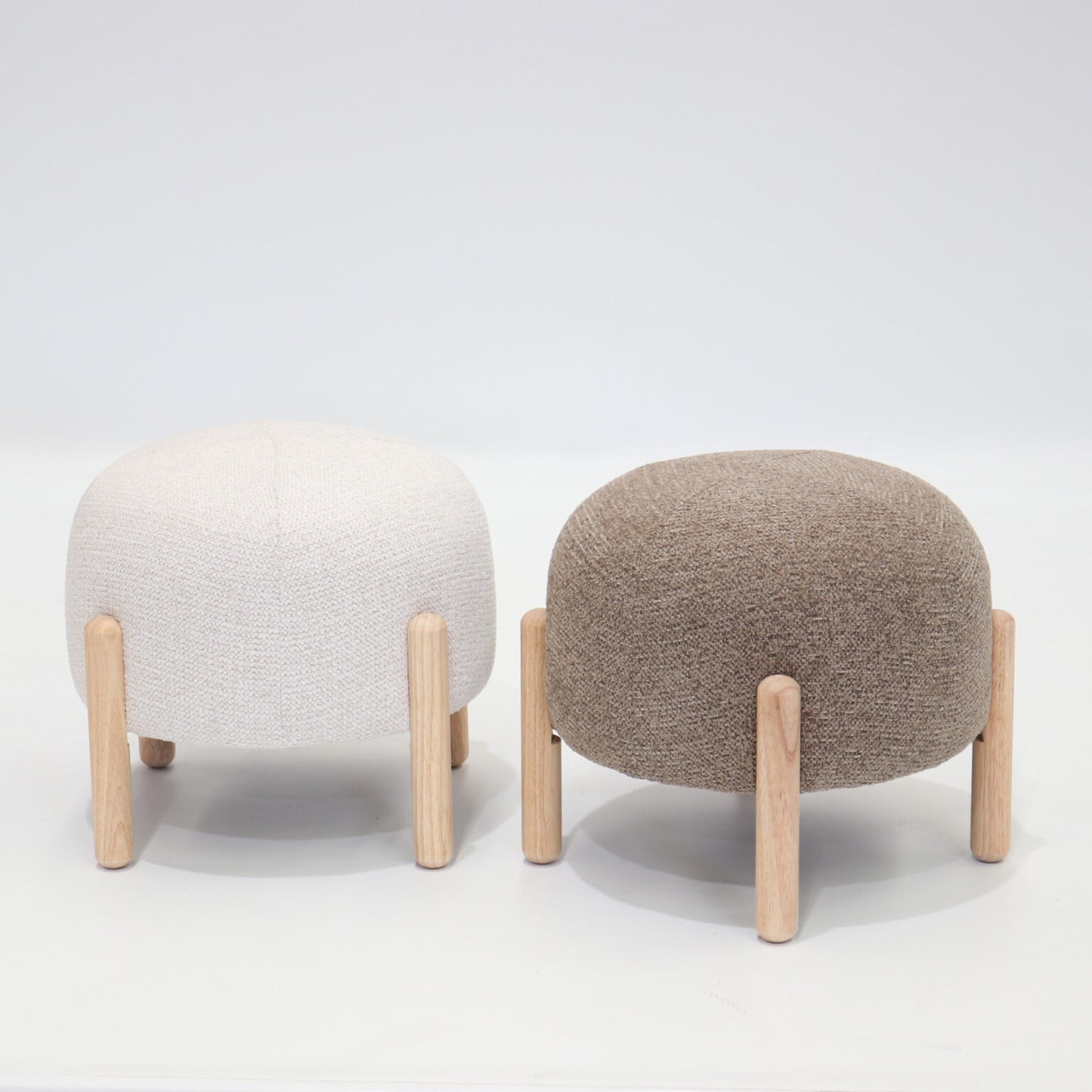 A versatile upholstered stool in a rich coffee tone, blending comfort, function, and contemporary style.