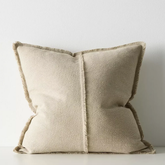 Shop the Adela cushion in 50x50cm or 40x60cm – a linen-cotton blend with textured weave and raw fringe detailing, perfect for layered contemporary styling.