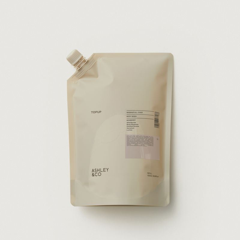 Beige refill pouch with 'ASHLEY & CO' branding on a light gray background