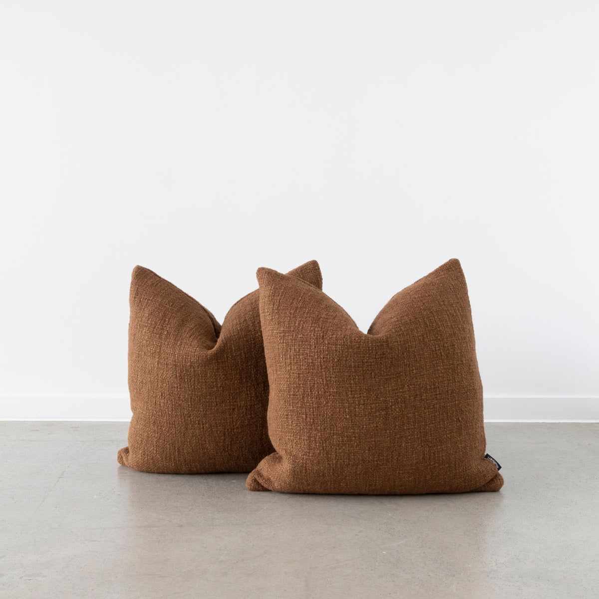Cyprian Cushion in natural fibre blend with handwoven slub yarns
