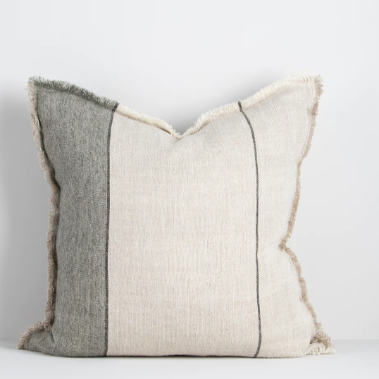 Textured linen cushion with raw fringing for modern interiors