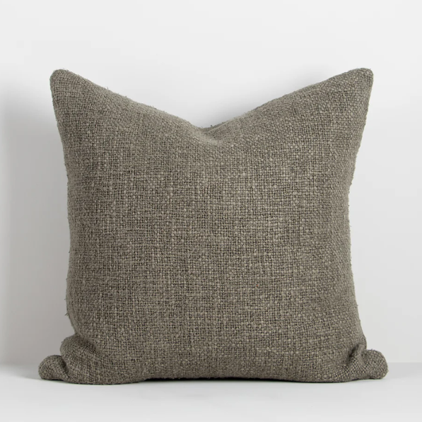 Modern artisan-style cushion in seasonal colour tones
