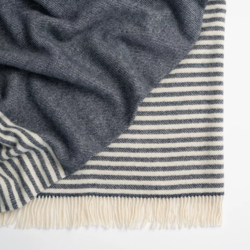 Catlins throw draped over a sofa for cozy living
