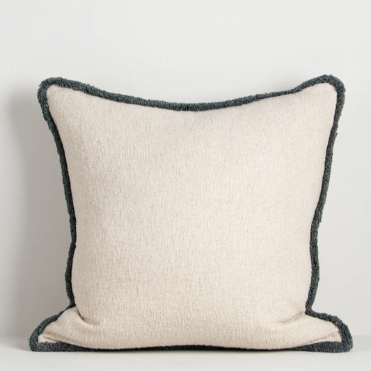 55x55cm Darcy Cushion styled on a sofa with neutral décor