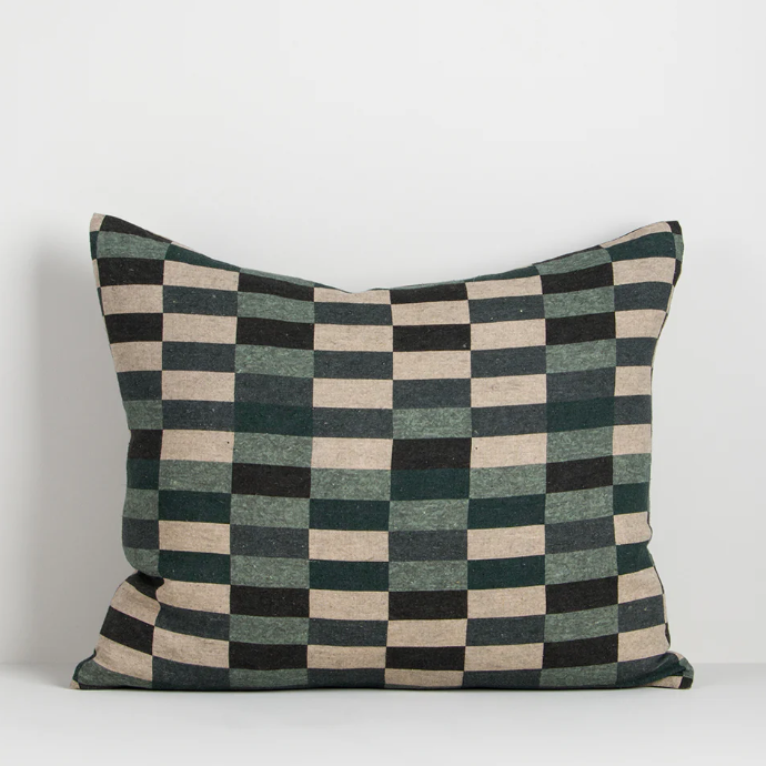 The Hugo 45x55cm lumbar cushion features a moss-green grid print on pure linen, blending natural tones with a contemporary graphic edge.