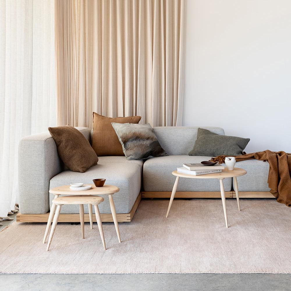Loom-knotted blush wool rug styled in modern living room – BLACK Concept Store