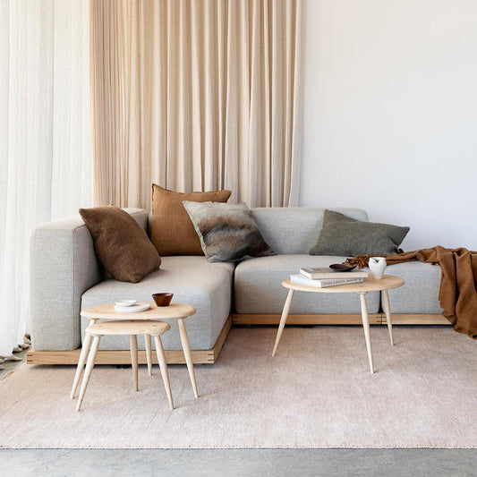 Loom-knotted blush wool rug styled in modern living room – BLACK Concept Store