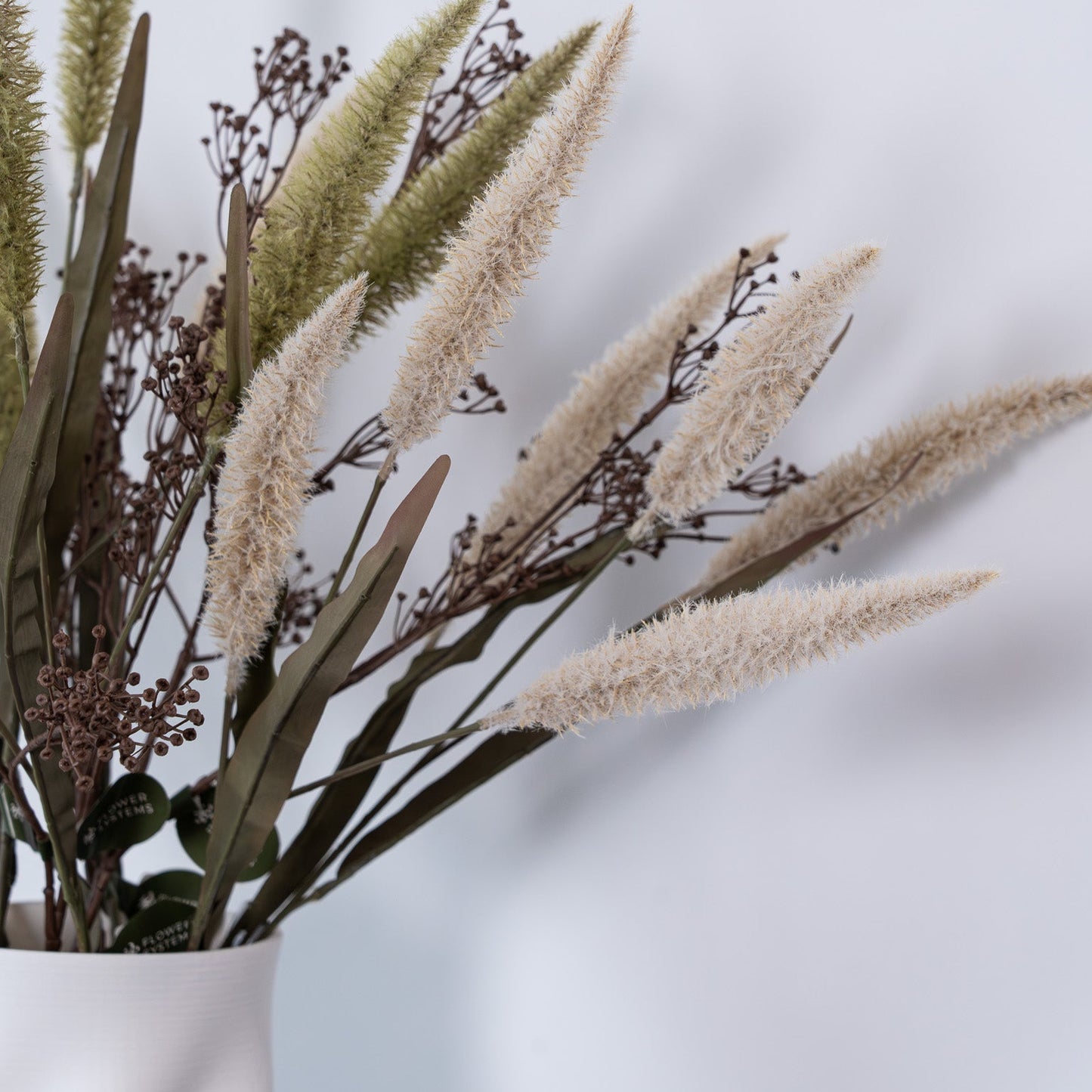 Discover the Bella Small Vase in white – a contemporary 3D printed ceramic piece with a sculptural silhouette, perfect for modern styling and decorative displays.