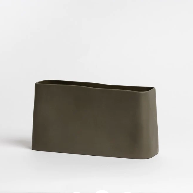 Durable stoneware planter with organic shape
