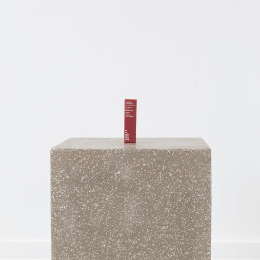 Close-up of natural beeswax lip balm texture