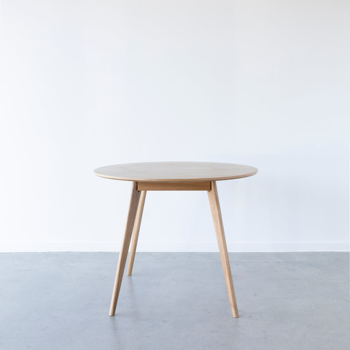 Small round oak dining table seating 4