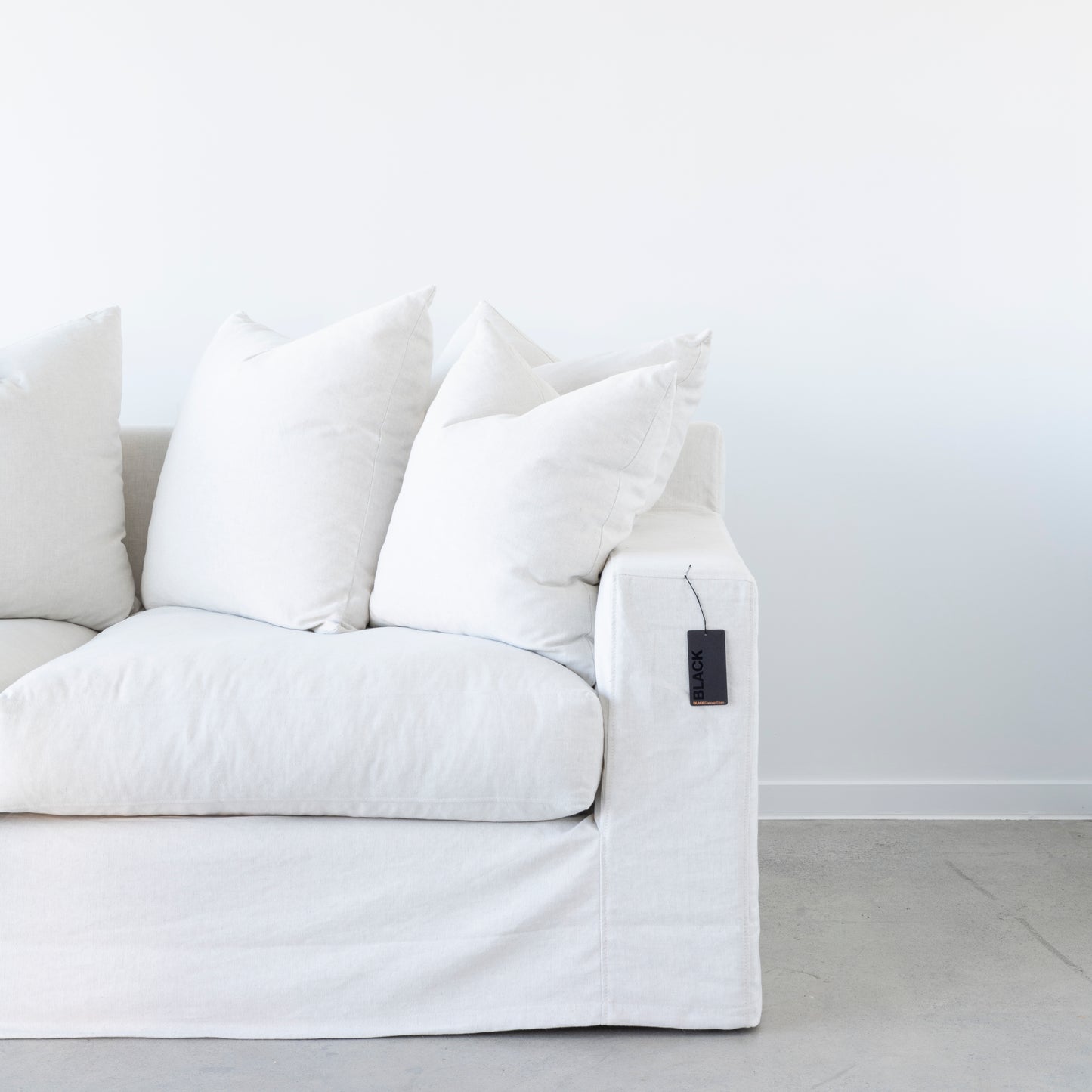 Comfortable 3.5 seater sofa with plush cushions and removable cover