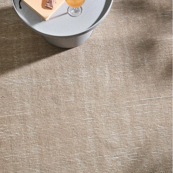 Soft mottled PET fibre rug made from recycled plastic bottles