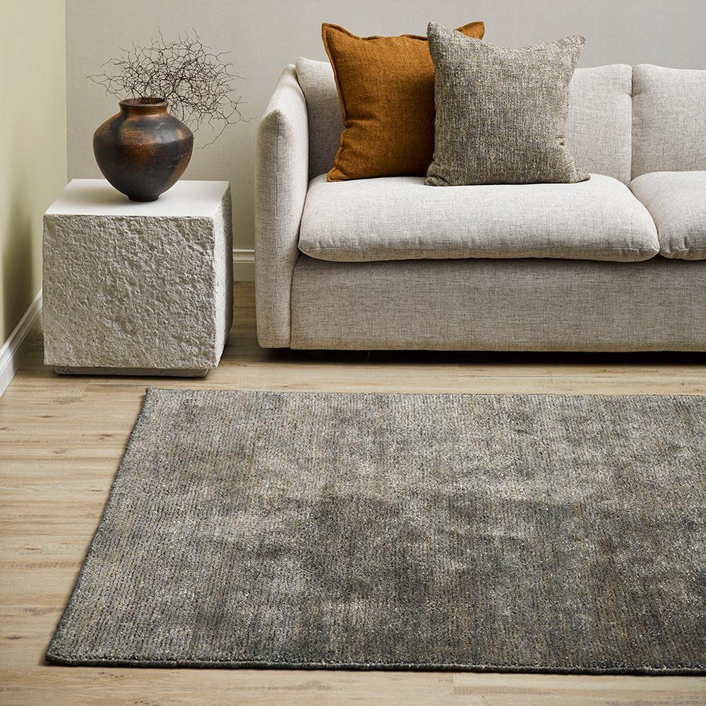 Handmade tufted Anchorage rug styled in living room or lounge – BLACK Concept Store