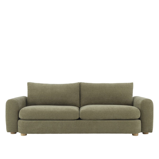A generously scaled sofa with soft structure, deep comfort, and a richly textured chenille finish.