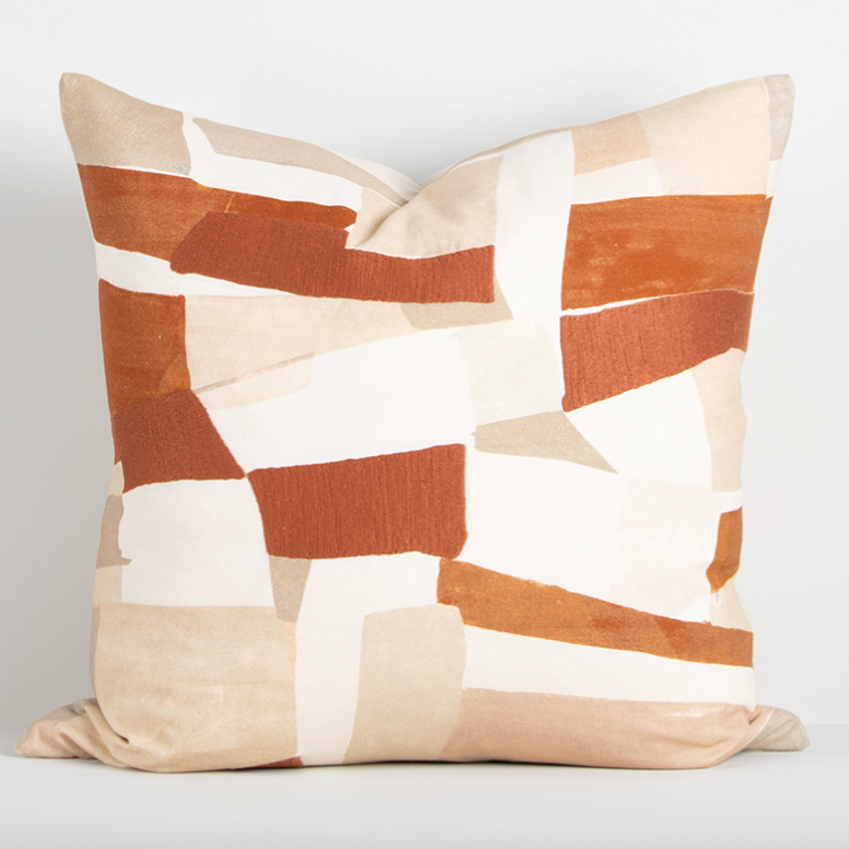 Close-up of Lucio Cushion’s matte embroidery details