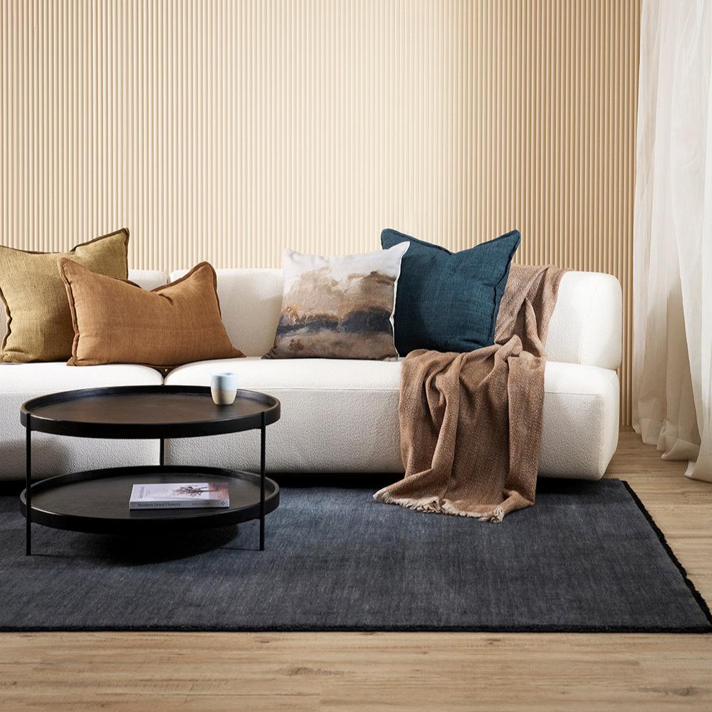 Soft, dense pile rug with delicate fringing at both ends