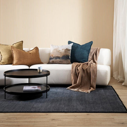 Soft, dense pile rug with delicate fringing at both ends