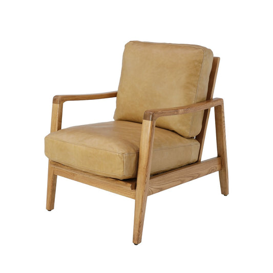 The Reid Armchair blends contemporary design with premium comfort, featuring hand-dyed leather, a sculptural strap backrest with brass buckle detail, and a supportive foam and feather cushion combination.