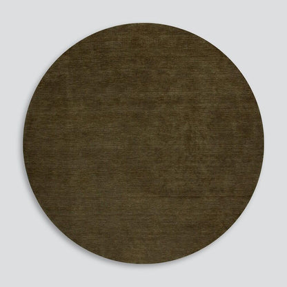 Sandringham Floor Rug by Baya in rich earthen tones, round shape