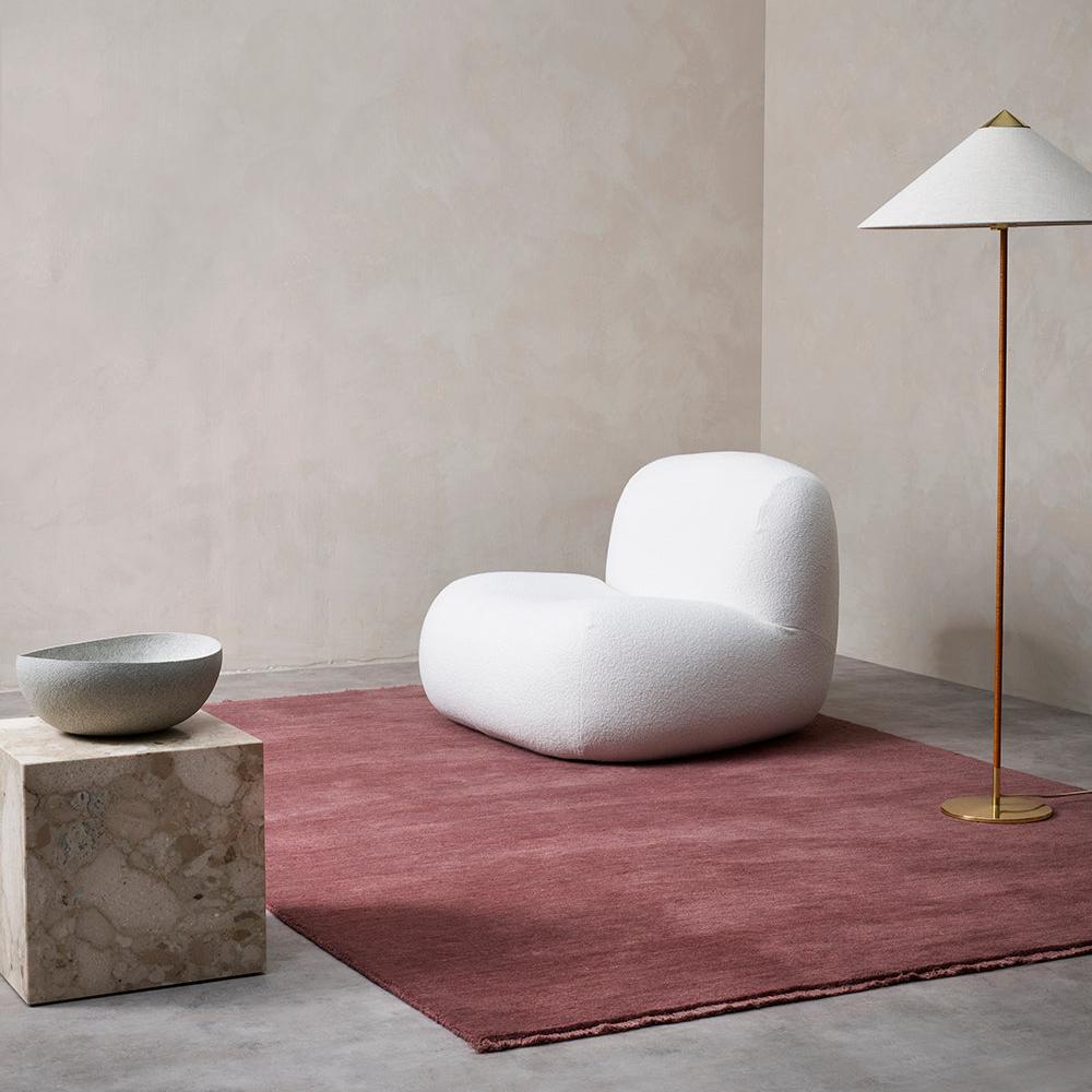 Loom-knotted merlot wool rug styled in modern living room – BLACK Concept Store