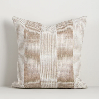 Shop the Baya Tide Outdoor Cushion at Comber and Comber. Handwoven from recycled PET with a textured linear design. Available in multiple colours.
