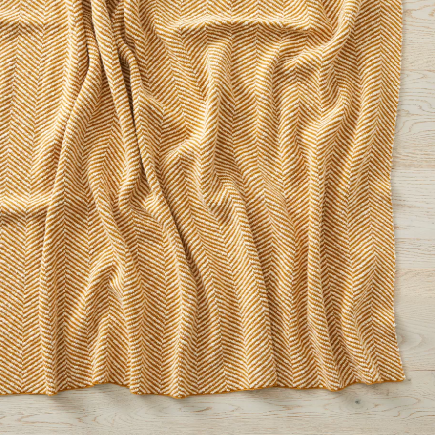 Soft and luxurious Solano Amber throw for home decor