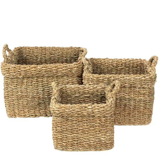 Three woven baskets of different sizes on a white background