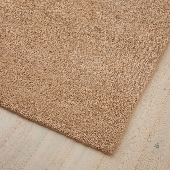 Close-up of thick wool pile on Valencia Latte rug – BLACK Concept Store