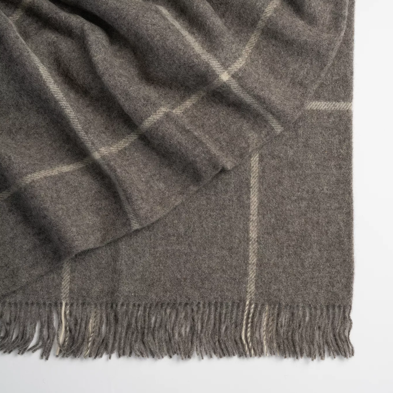Shop the Ranfurly wool throw 140x240cm – a thick, warm check design inspired by the Maniototo region, perfect for timeless styling and cosy living.