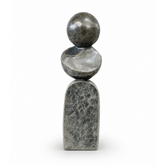 A striking contemporary sculpture with a minimalist silhouette, designed to bring modern elegance and sculptural interest to any interior.