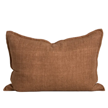 The Arcadia Cushion in warm mushroom linen is handwoven with a refined flange edge, offering timeless style and a relaxed contemporary feel.