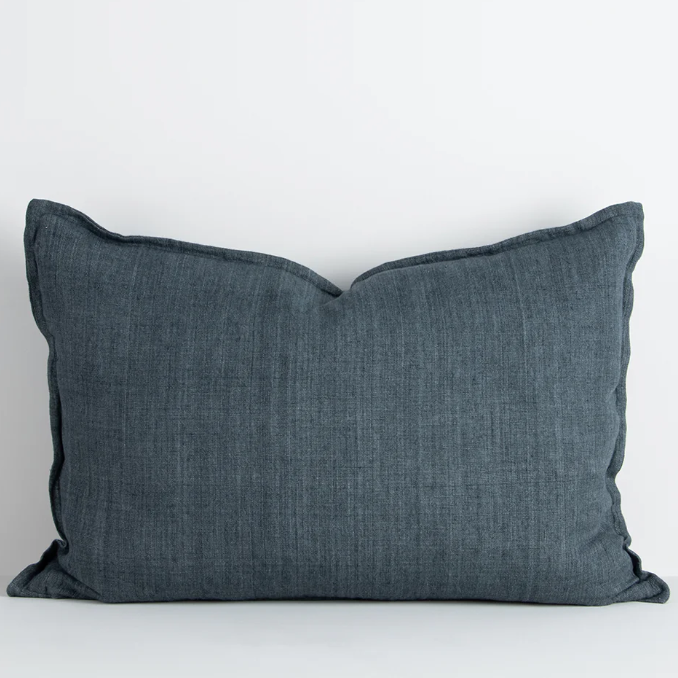 The Arcadia Cushion in warm mushroom linen is handwoven with a refined flange edge, offering timeless style and a relaxed contemporary feel.