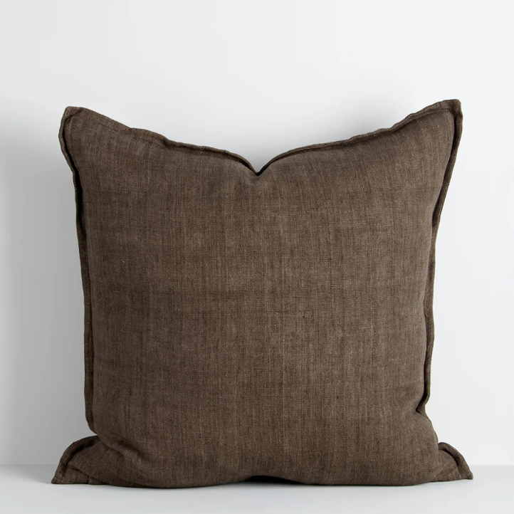 The Cassia 50x50cm cushion is handwoven from 100% linen with a refined flange edge, offering a timeless and contemporary accent for relaxed interiors.