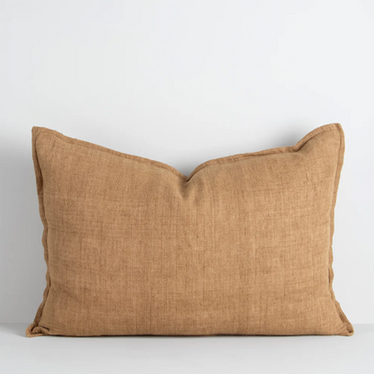 The Arcadia Cushion in warm mushroom linen is handwoven with a refined flange edge, offering timeless style and a relaxed contemporary feel.