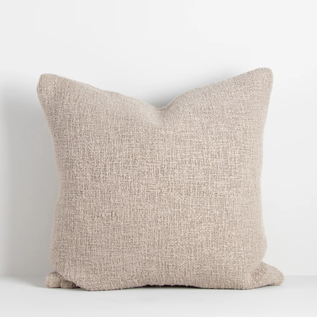 Modern artisan-style cushion in seasonal colour tones