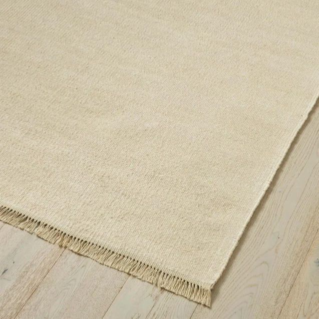Handwoven 100% linen flatweave rug with fringe detail