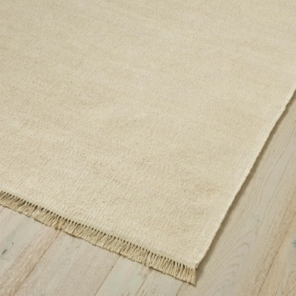 Handwoven 100% linen flatweave rug with fringe detail