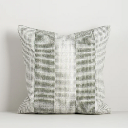 Shop the Baya Tide Outdoor Cushion at Comber and Comber. Handwoven from recycled PET with a textured linear design. Available in multiple colours.