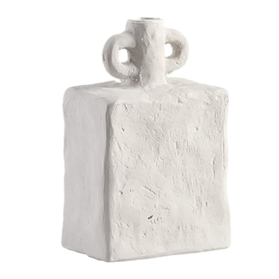 A modern sculptural accent, the Lunar Handle Vase – Small features a distinctive curved handle and minimalist form, perfect for styling with simple stems or displaying as a decorative object.