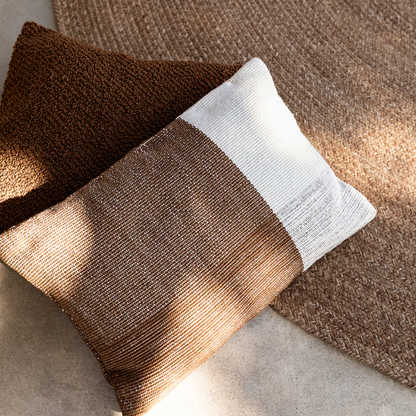 Textured cushion suitable for indoor and outdoor settings