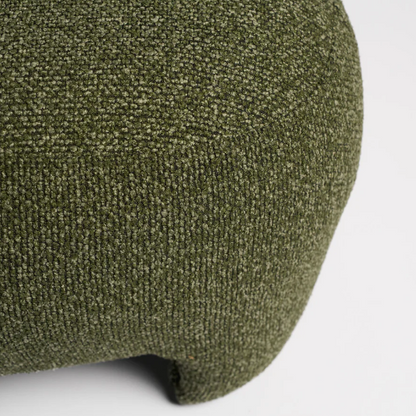 Bayside Ottoman combines form and function with a sculptural silhouette and textured materials. Versatile seating or chic accent for modern interiors.