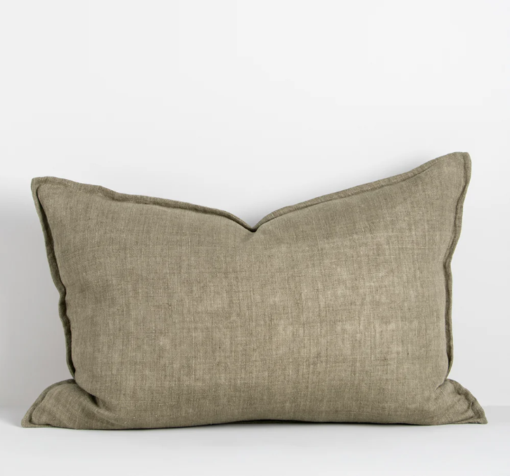 The Arcadia Cushion in warm mushroom linen is handwoven with a refined flange edge, offering timeless style and a relaxed contemporary feel.