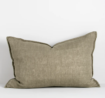 The Arcadia Cushion in warm mushroom linen is handwoven with a refined flange edge, offering timeless style and a relaxed contemporary feel.