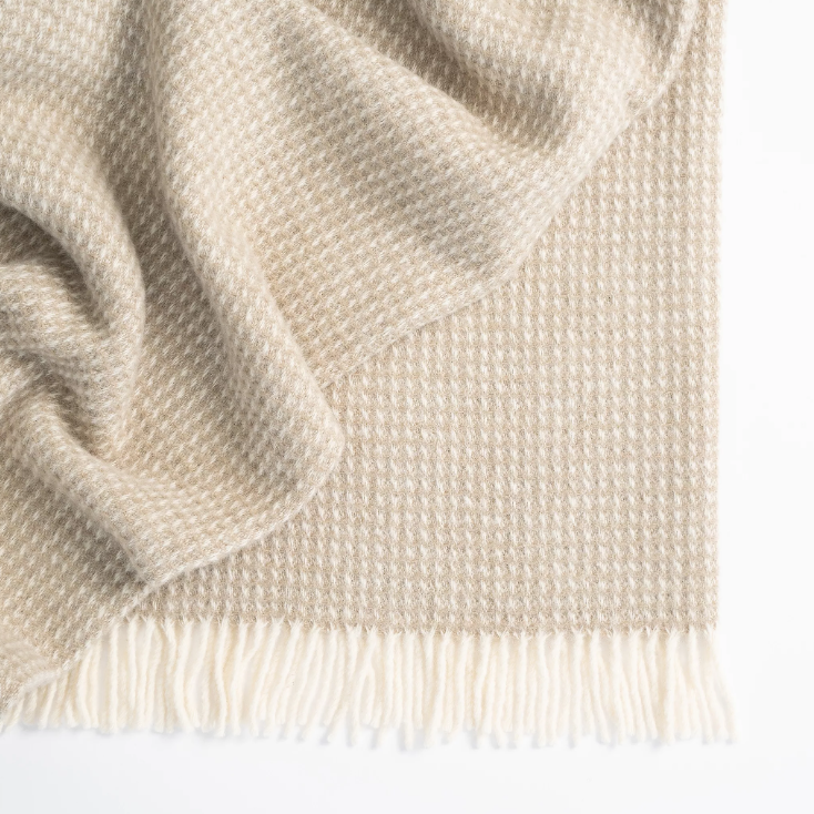 Shop the Breckon wool throw 140x240cm – a soft 100% New Zealand wool waffle weave throw, offering texture, warmth, and timeless style for any home.