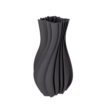 Discover the Louella Grey Large Vase – a 3D printed ceramic piece with a textured finish and watertight design, ideal for modern floral arrangements or decorative styling.